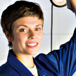 Female mechanic, smiling, portrait